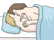 Ein Mann und eine Frau haben Sex im Bett.